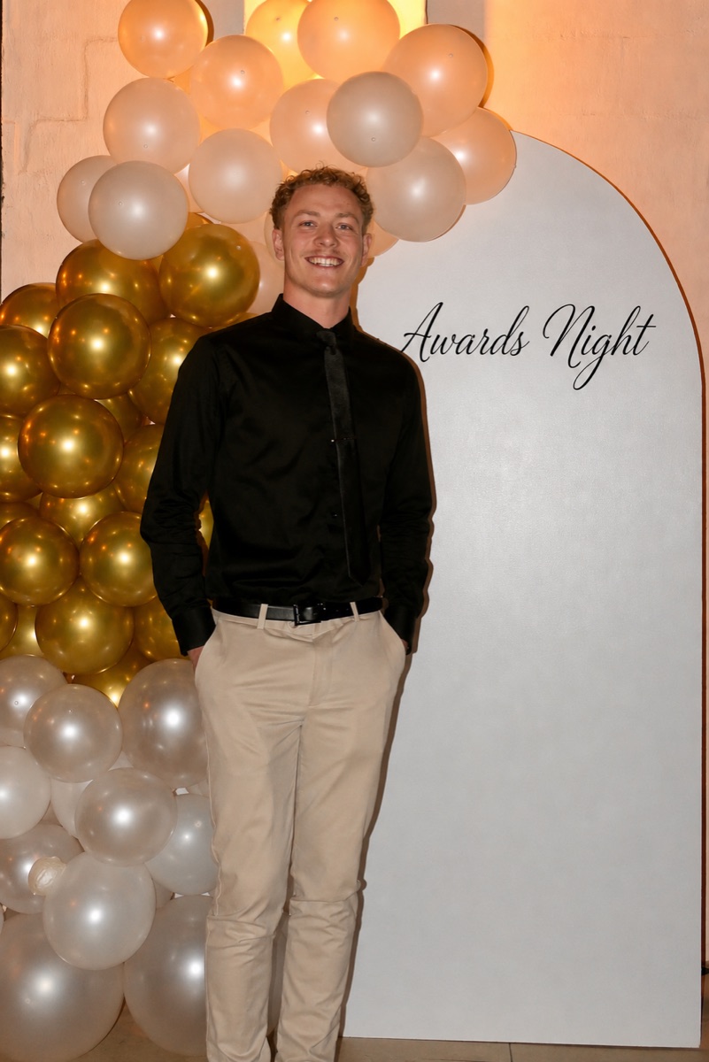 Xavier Walker at a formal awards event